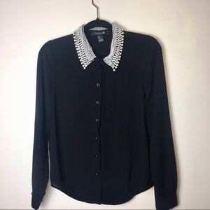 Black blouse with pearl collar